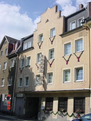 a building on the side of a street at Hotel Schmidt in Selb