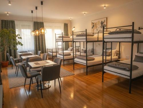 a room with several bunk beds in it at Noclegi PODZAMCZE PTTK in Przemyśl