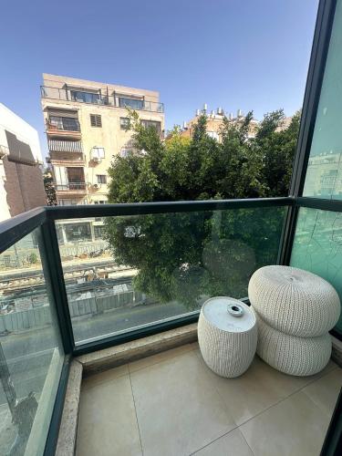 En balkon eller terrasse på H7 TLV
