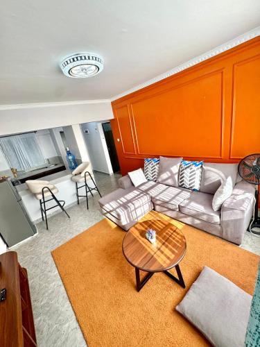 Zona d'estar a Queens Stay 2Br