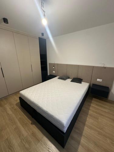 a bedroom with a large bed in a room at Apartament rodzinny in Łańcut
