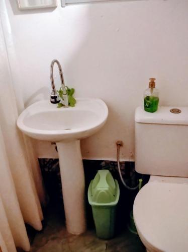 a bathroom with a sink and a toilet at El secreto in Ciudad de la Costa