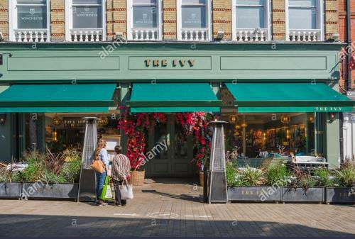 people walking in front of a store at Freemantle Solent Lodge in Southampton