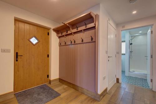 a large room with a closet and a door at Wallower in Harpley