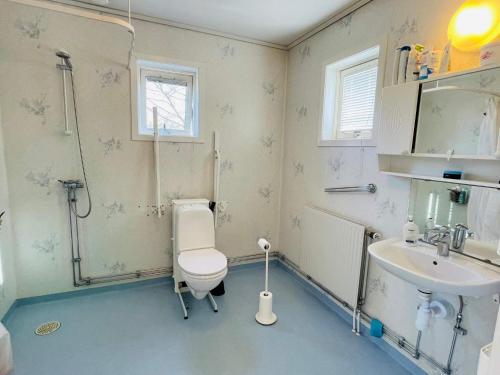 a bathroom with a toilet and a sink at 8 person holiday home in Moheda-By Traum in Moheda
