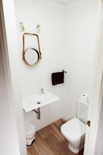 a bathroom with a sink and a toilet at Loft Valentia Olta Calpe in Calpe