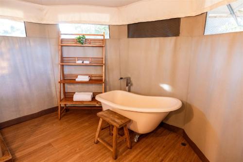 a bathroom with a sink and a bath tub at Ingenia Holidays Rivershore in Maroochydore