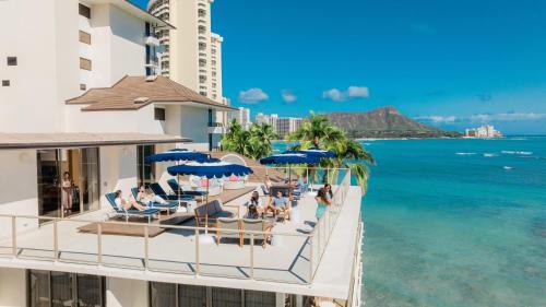 a view of the ocean from the balcony of a hotel at OUTRIGGER Reef Waikiki Beach Resort in Honolulu