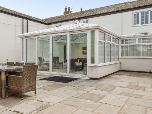 an extension of a conservatory on a house at Bank Lane House in Freckleton