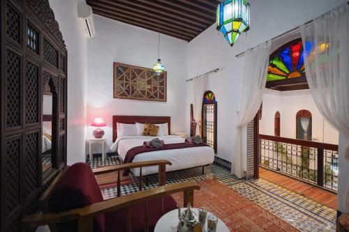 Llit o llits en una habitació de Riad Dar Iman