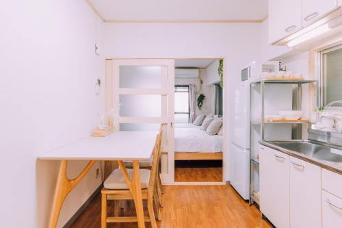 Bright & Convenient 1BR in Hakata, Steps from STN