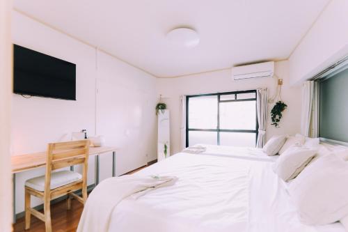 Bright & Convenient 1BR in Hakata, Steps from STN