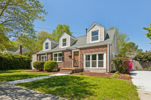 a brick house with a driveway at Tog Gun R&R I in Norfolk