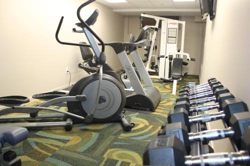 a gym with cardio equipment in a room at Travelodge by Wyndham Fort McMurray in Fort McMurray