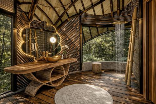 a room in a tree house with a mirror at BELALU Bali Boutique & SPA experience in Ubud