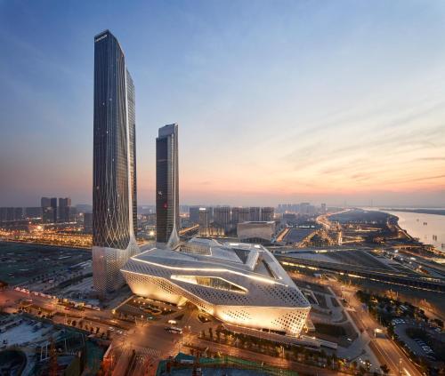 a view of a city with two tall buildings at Jumeirah Nanjing in Nanjing