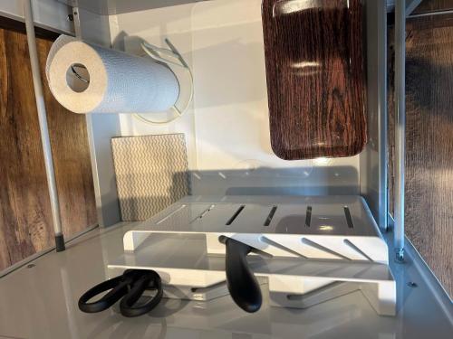 a drawer in an rv with a roll of toilet paper at リベルテ Work & Vacation Villa Nosoko in Ibaruma