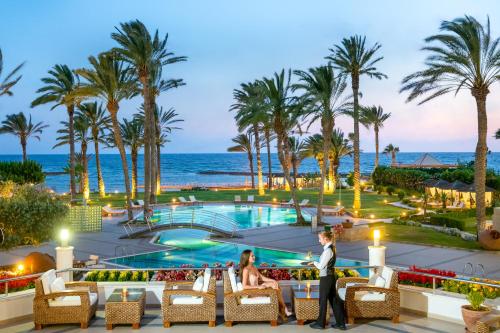 a view of the pool at the resort at Constantinou Bros Asimina Suites Hotel in Paphos