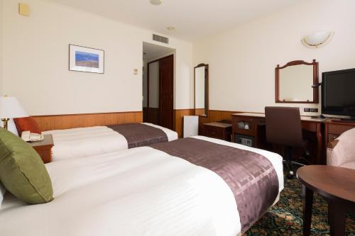 Postel nebo postele na pokoji v ubytování Premier Hotel -CABIN- Obihiro