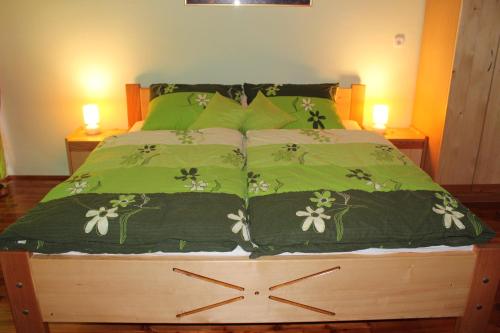 Un ou plusieurs lits dans un hébergement de l'établissement Apartments Peternelj