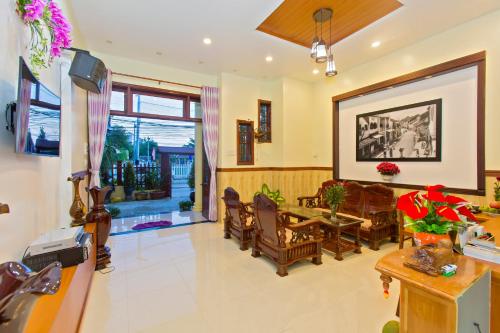 
The lobby or reception area at Qua Cam Tim Homestay
