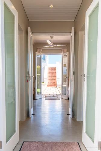 a hallway of a home with a ceiling fan at Maggie's Gift in McGregor