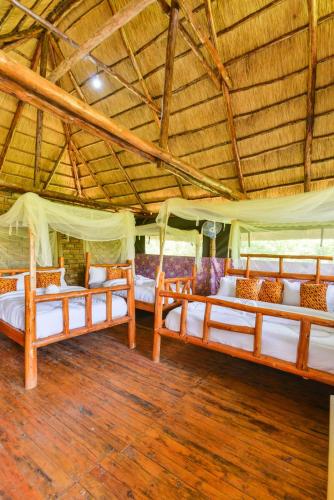 Llit o llits en una habitació de Elephant View Lodge