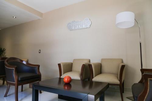 Posezení v ubytování Howard Johnson Resort & Spa Escobar
