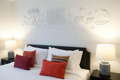 Una cama o camas en una habitación de Makkachiva