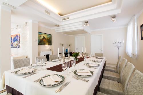 Zona de estar de Park Hotel Ai Pini & Restaurant Ai Pini