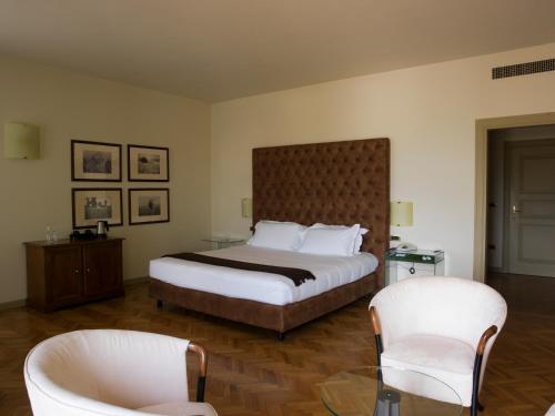 Katil atau katil-katil dalam bilik di Relaisfranciacorta