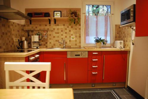 Kuchyň nebo kuchyňský kout v ubytování Am Berggarten