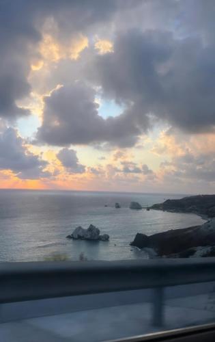 a view of the ocean from a car window at Georgia Apartments in Paphos