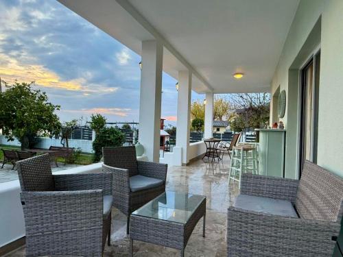 Sunrise Beach Front Villa by BookVillaEU