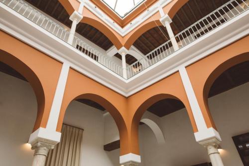 an image of a building with a spiral staircase at Palacio Pinello in Seville