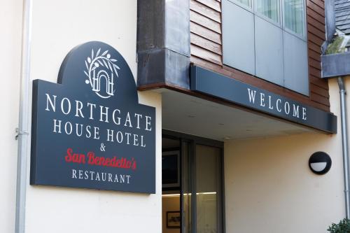 a building with a sign for a house hotel at Northgate House in Buckfastleigh