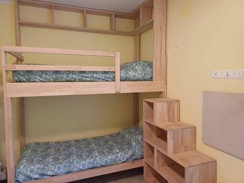 a bunk bed room with two bunk beds in it at Casa Rita in Civezza