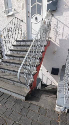 a set of stairs in front of a house at Souterrain Casa Siegburg in Siegburg