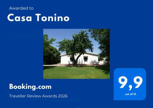 a picture of a house with a tree at Casa Tonino in Pisticci