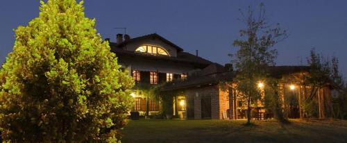 a large house with a window on top of it at BeB MadamaDorè in Andezeno