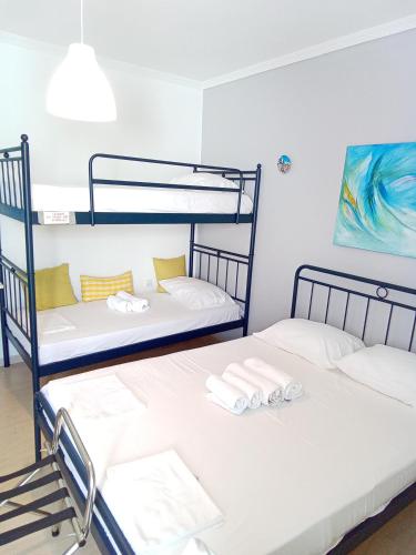 Vuode tai vuoteita majoituspaikassa Sunloft-Paros