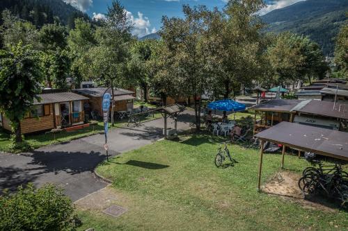 an aerial view of a small village with a park at Sarca Lodge Val Rendena in Dare