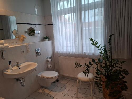 Ванная комната в Andersen Hotel Birkenwerder