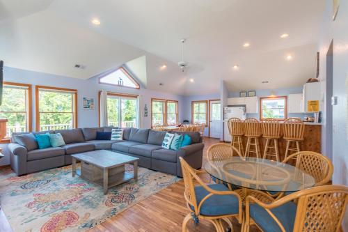 a living room with a couch and a table at 3944 - Carolina Escape in Duck