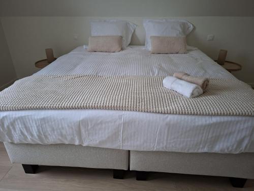 เตียงในห้องที่ Lindendreef