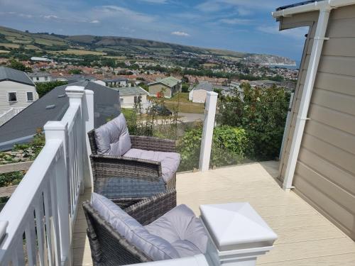 a balcony with a view of a city at Swanage Caravan in Swanage