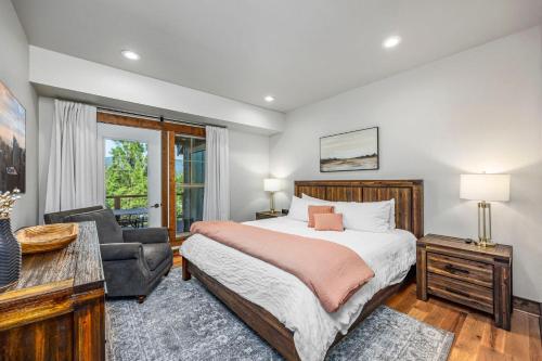 a bedroom with a bed and a desk and a chair at Ridgeview in Cle Elum