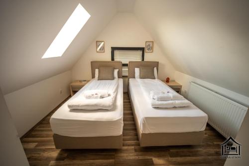 Postel nebo postele na pokoji v ubytování Colakation