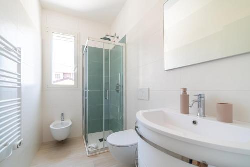 a bathroom with a sink and a toilet and a shower at Camilla al mare in Tortoreto Lido
