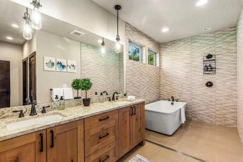 a bathroom with a tub and a sink and a bath tub at 281 Big Rock in Cle Elum
